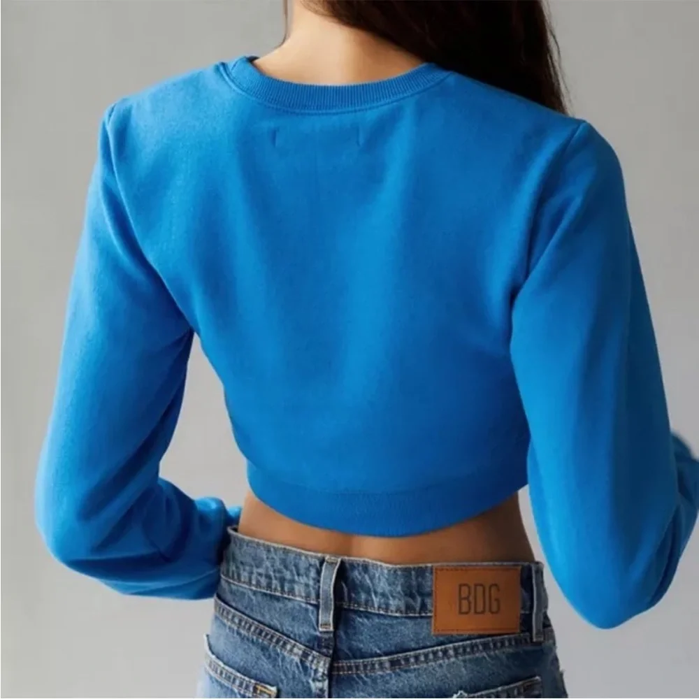 NWOT 🩵Urban Outfitters Bright Blue Embroidered Peace Cropped sweatshirt size XS